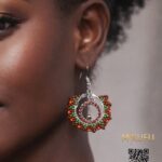 brown beaded earrings in a silver frame
