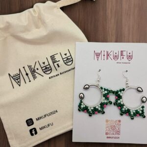 small green earrings made of beads in a silver