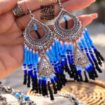 beaded earrings with a silver frame